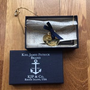 Gold necklace with navy bow and pearls